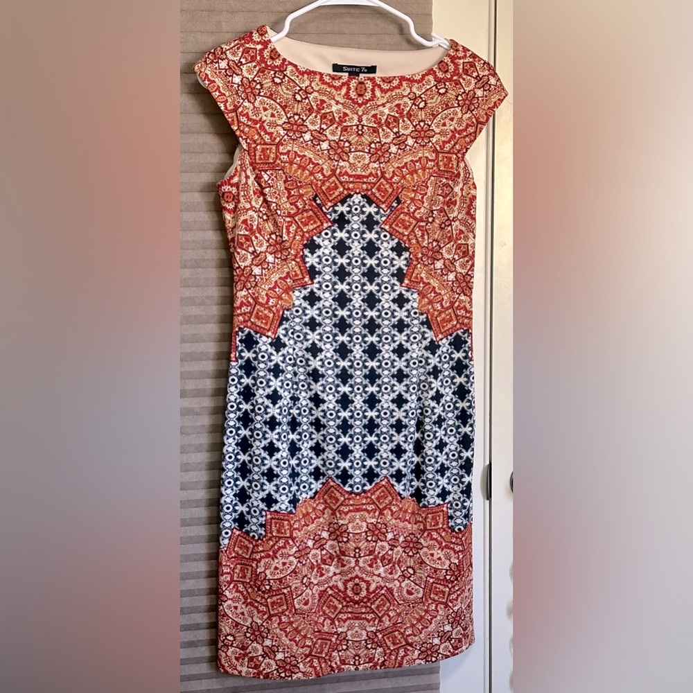 Dress is Suite 7 brand and it’s small petite.